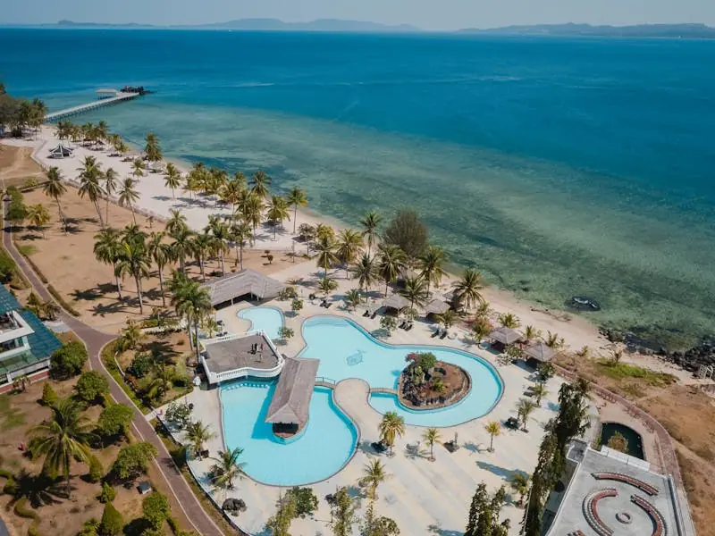 The Dunes seen from above, pool framed by the coastline